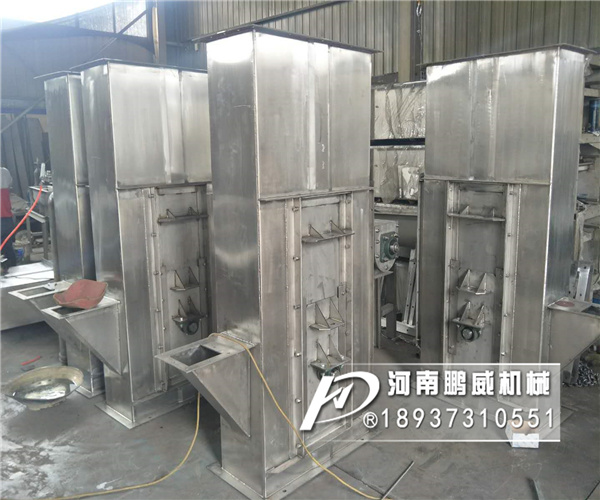 粘性物料斗式提升機料斗沾料有什么辦法可以解決？